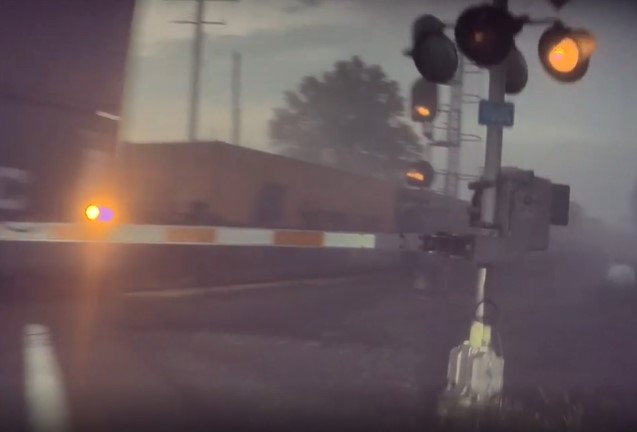 Tesla Model 3 almost crash with a train